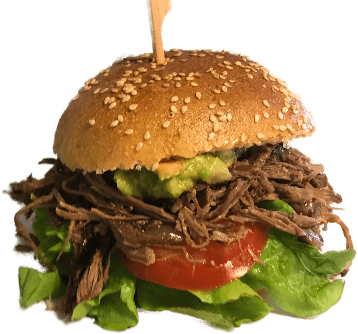 Burger im Sesam-Bun mit gezupftem Fleisch, Guacamole, Tomate und Salat